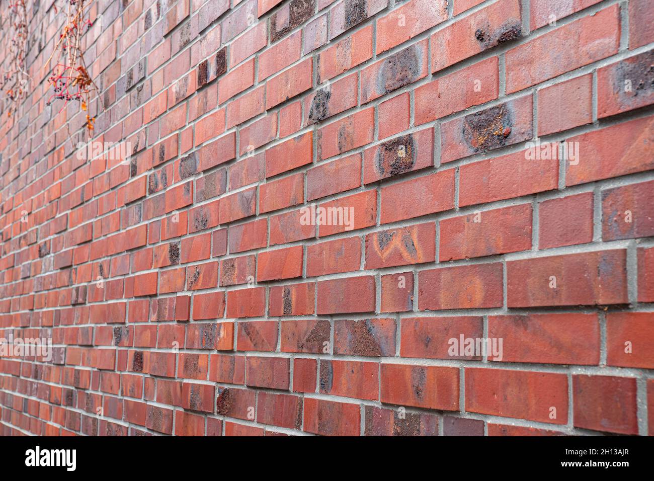Red brick wall in perspective Stock Photo
