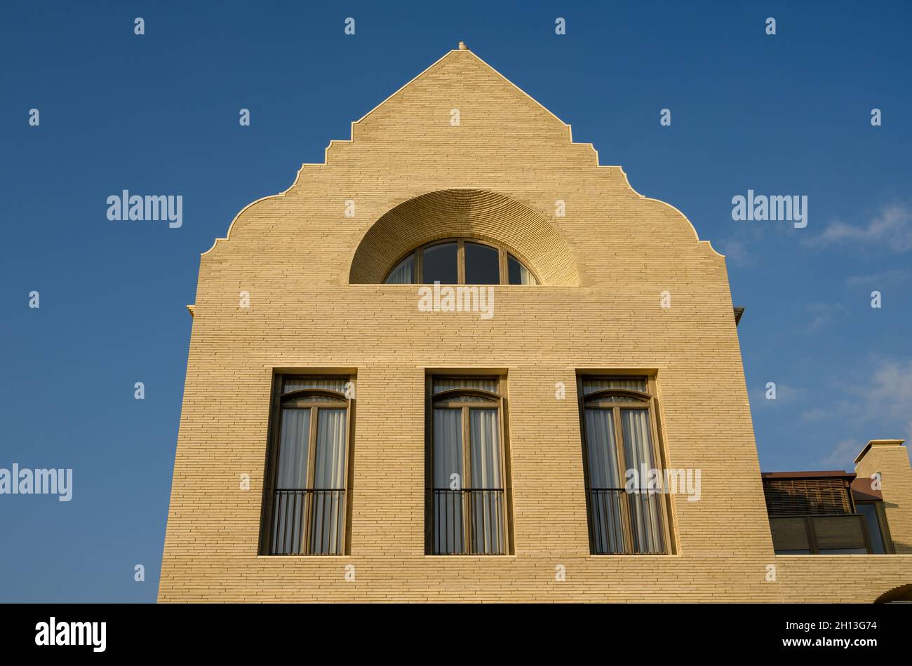 Top exterior front facade of the rebuilt old bath house, Medina House, now owned by David Gilmour and wife Polly Samson. Hove, East Sussex, England. Stock Photo