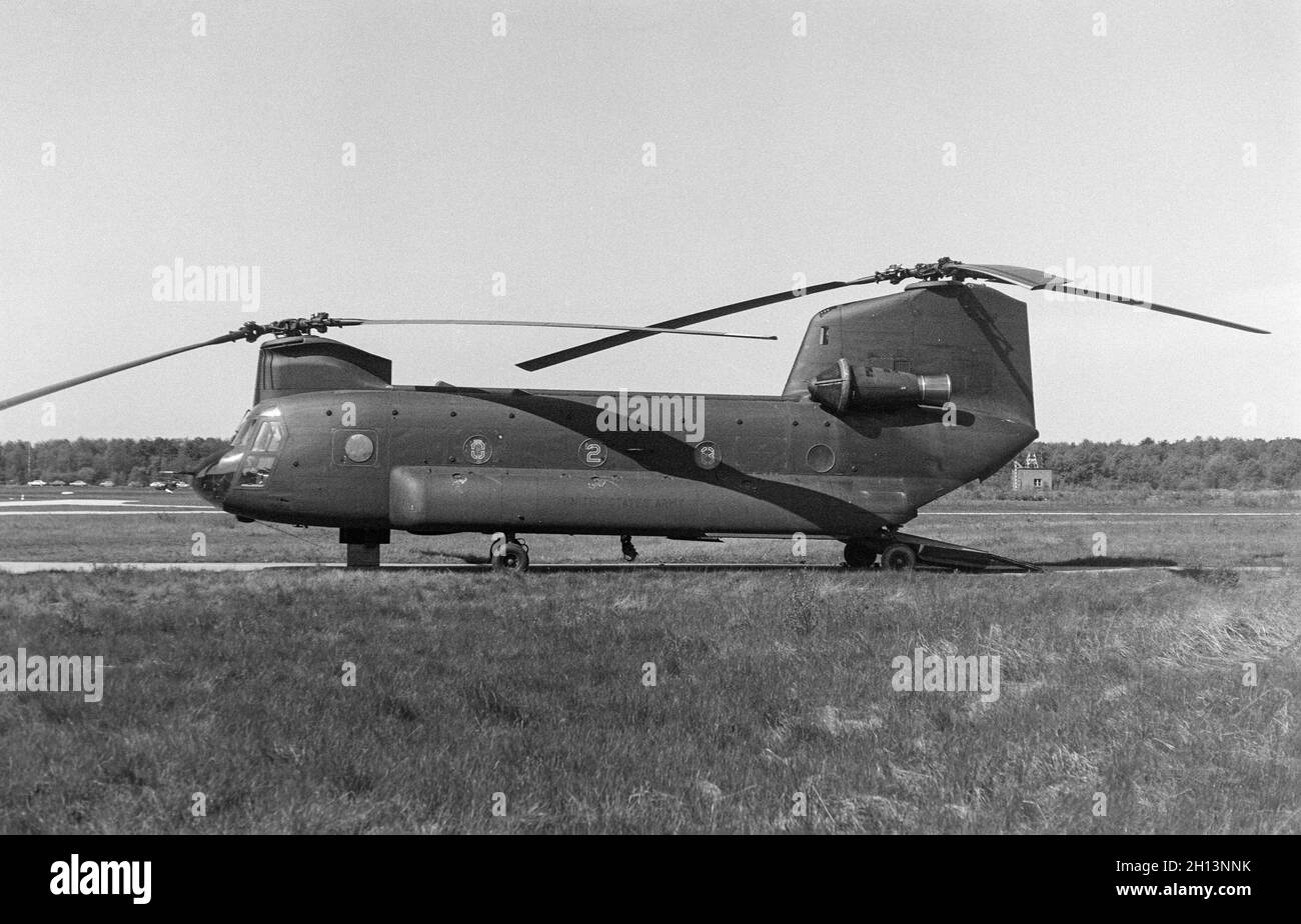 A United States Army Boeing Vertol CH-47C Chinook Helicopter at Brasschaat Airport in Belgium on 19th May 1979. serial number 70-15028. Stock Photo