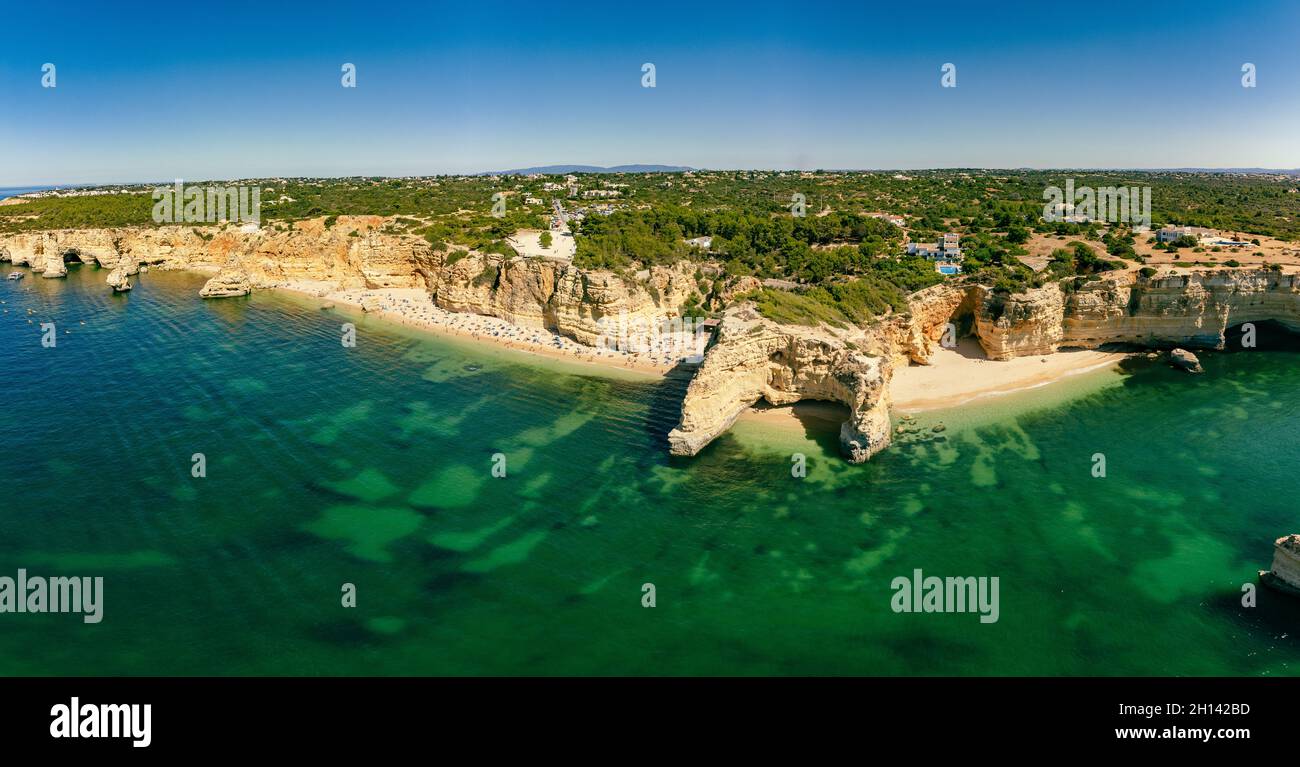 Aerial drone views of Praia da Marinha and Malhada do Baraco - beaches ...