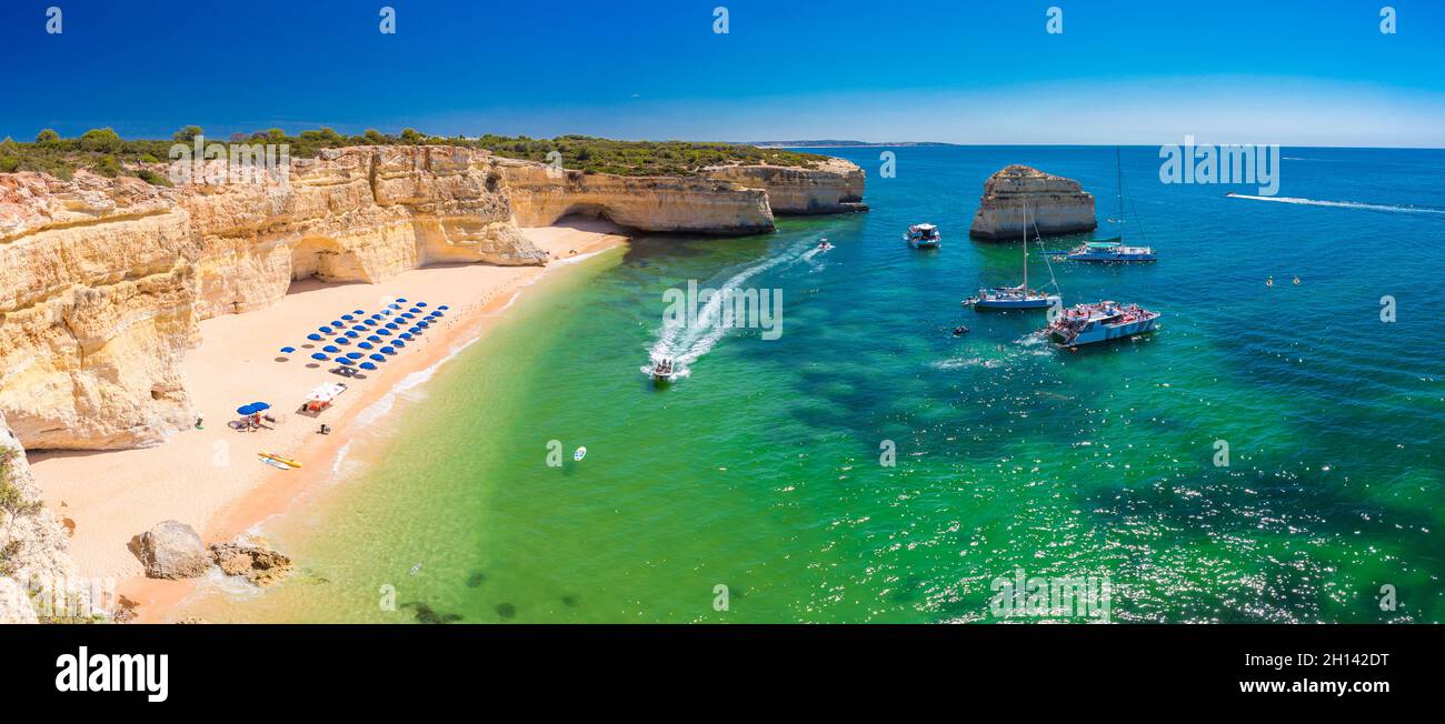 Aerial drone views of Praia da Marinha and Malhada do Baraco - beaches ...