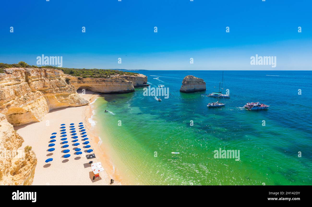 Aerial drone views of Praia da Marinha and Malhada do Baraco - beaches ...