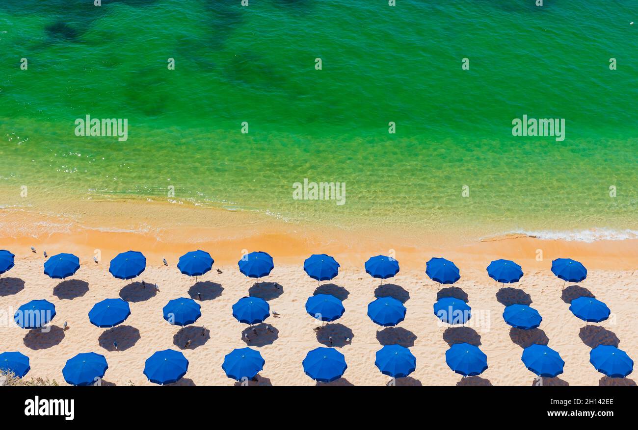Aerial drone views of Praia da Marinha and Malhada do Baraco - beaches ...
