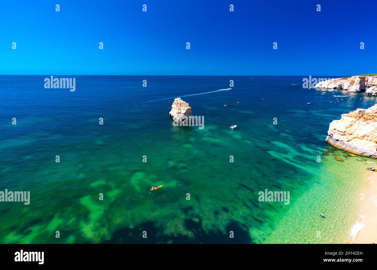 Aerial drone views of Praia da Marinha and Malhada do Baraco - beaches ...