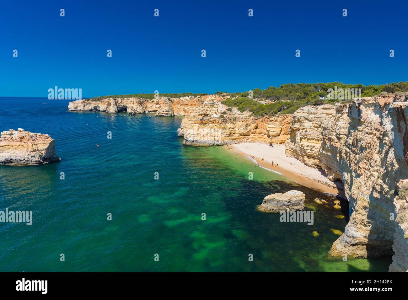 Aerial drone views of Praia da Marinha and Malhada do Baraco - beaches ...