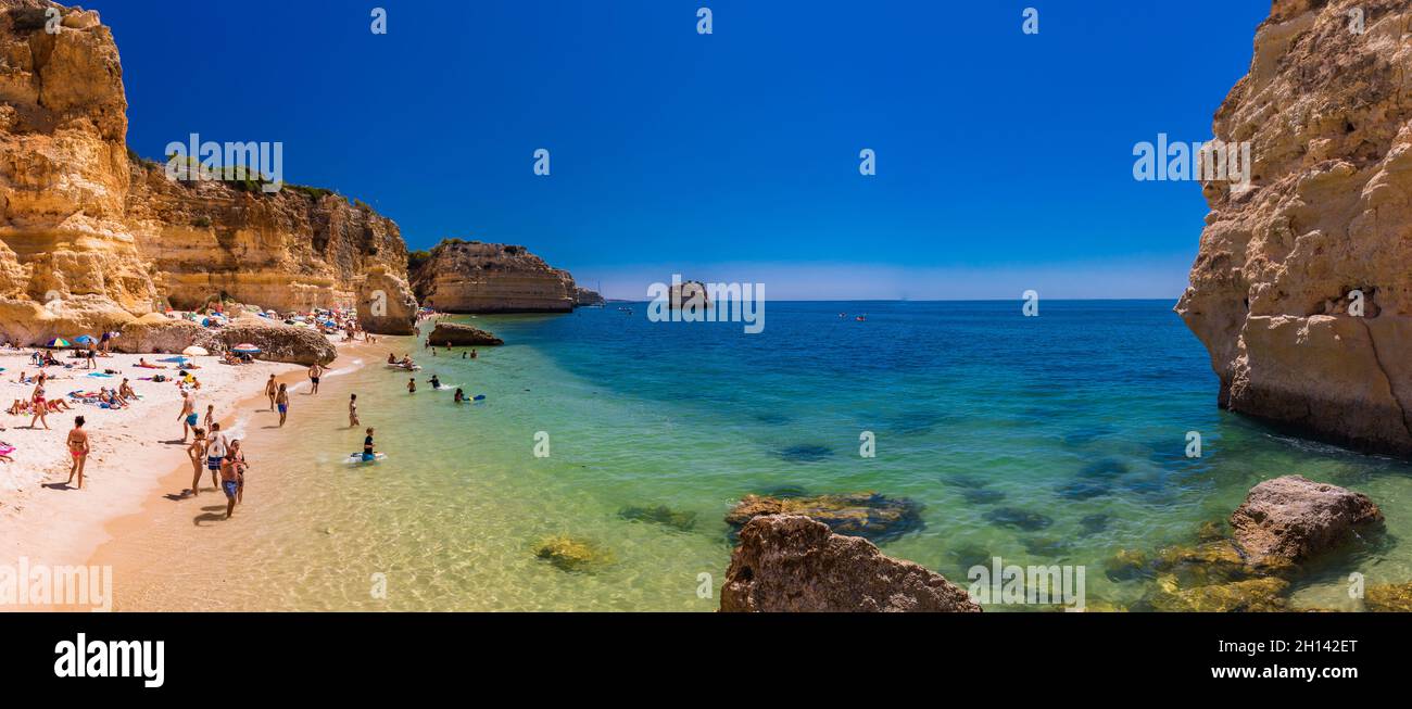 Aerial drone views of Praia da Marinha and Malhada do Baraco - beaches ...