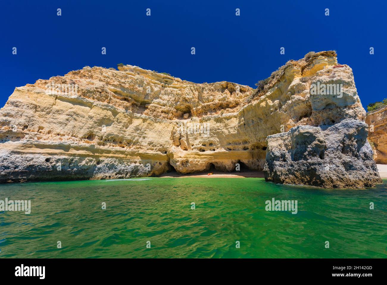 Aerial drone views of Praia da Marinha and Malhada do Baraco - beaches ...