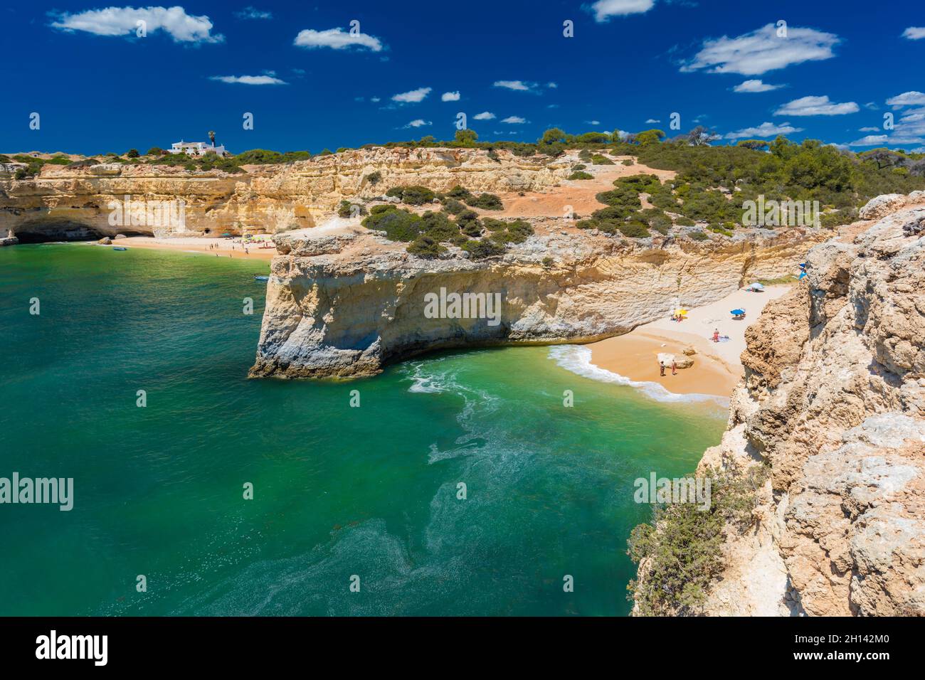 Aerial drone views of Praia da Marinha and Malhada do Baraco - beaches ...