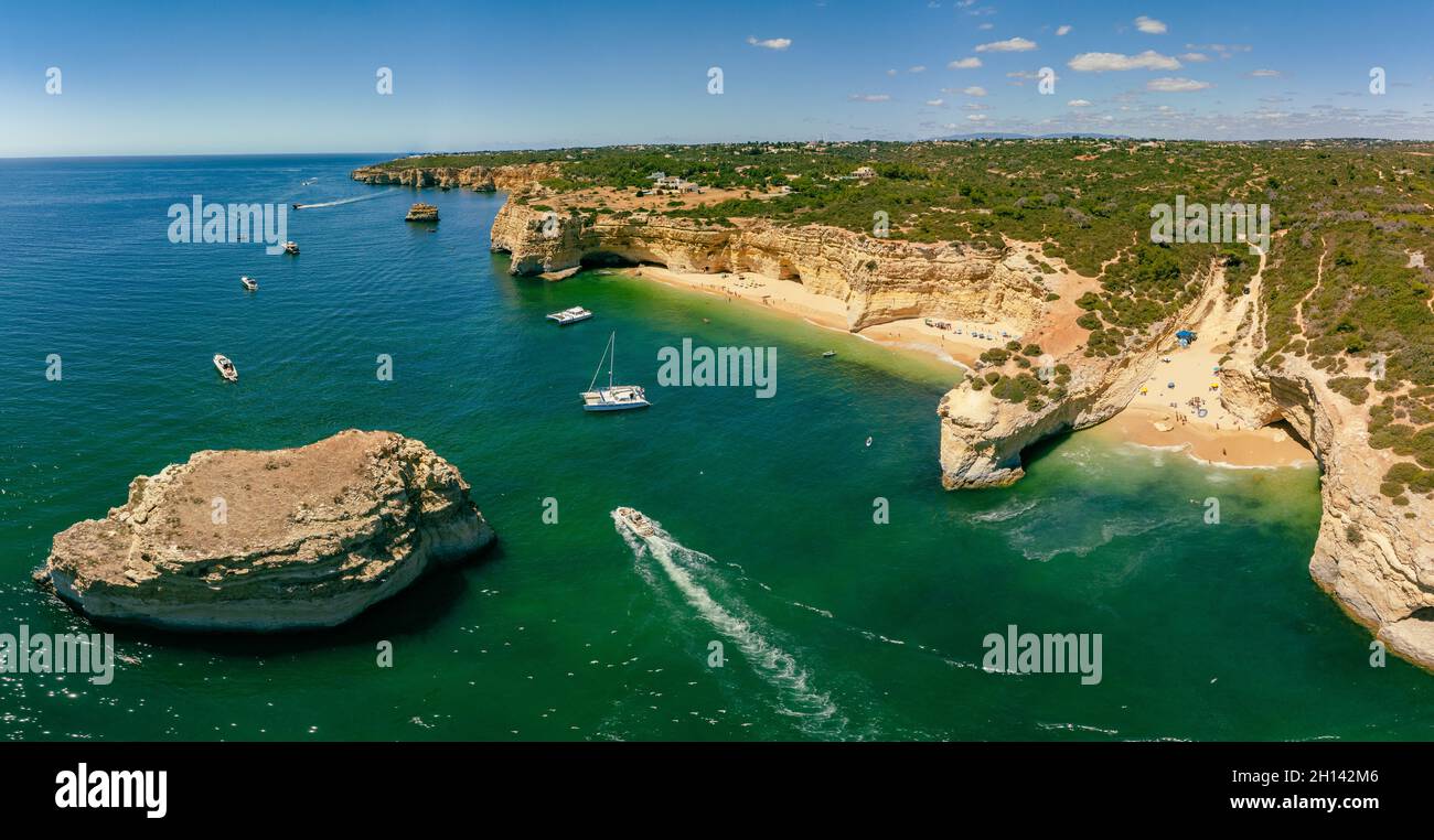Aerial drone views of Praia da Marinha and Malhada do Baraco - beaches ...