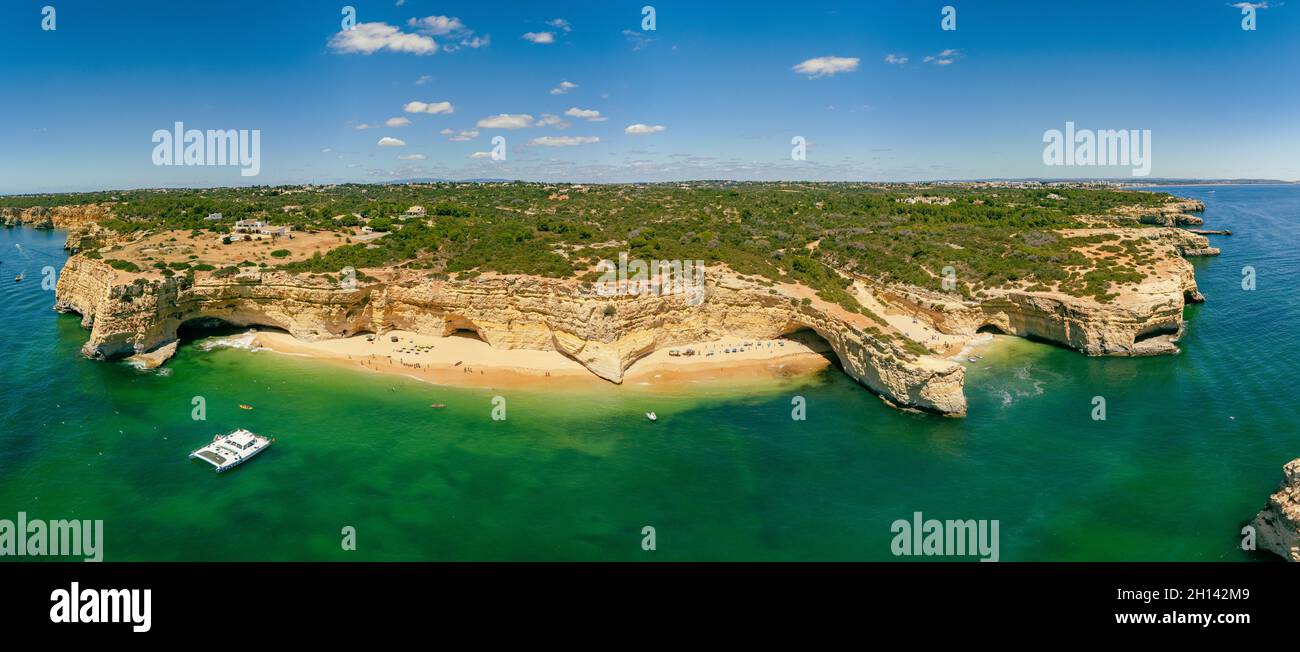 Aerial drone views of Praia da Marinha and Malhada do Baraco - beaches ...