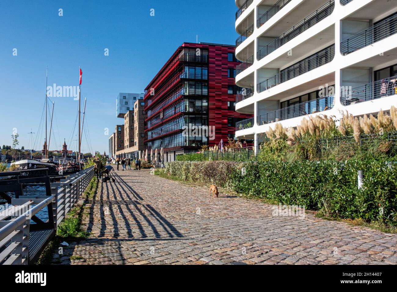 Modern buildings next to Spree River, apartment building, Coca Cola headqurters & NHow Hotel. Stralauer allee, Friedrichshain, Berlin Stock Photo