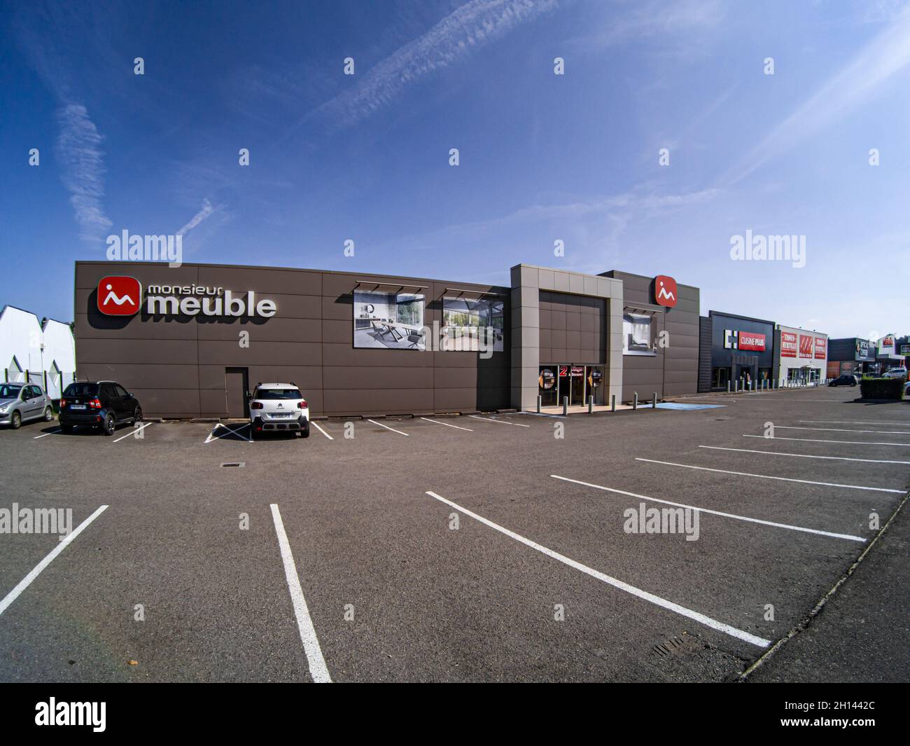 LE MANS, FRANCE - Sep 26, 2021: The front view of the Monsieur Meuble brand specializing in home furniture in Le Mans, France Stock Photo