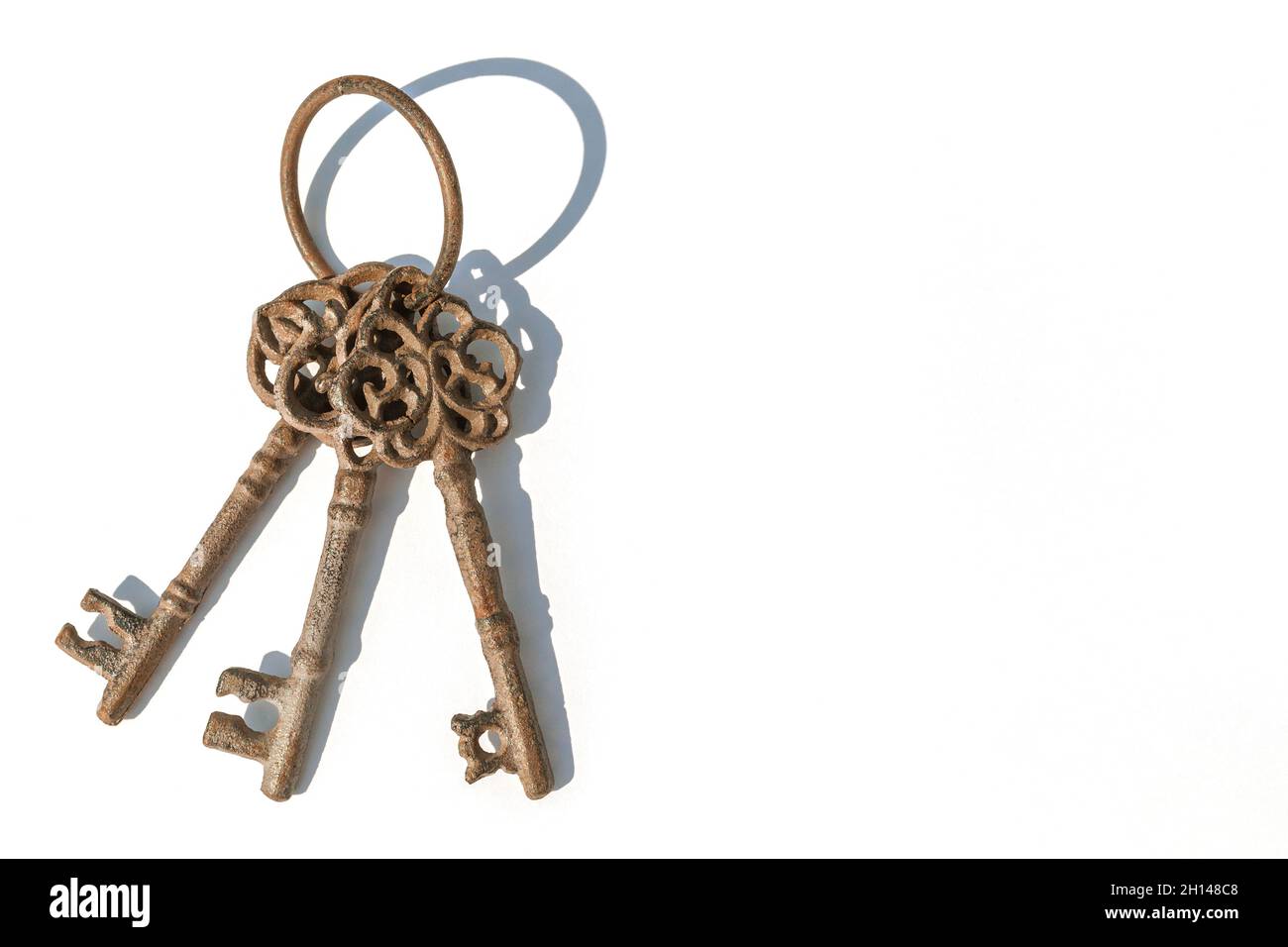 Antique keys on a white color background Stock Photo
