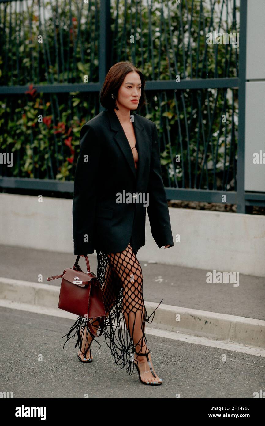 Street style, Tiffany Hsu arriving at Hermes Spring Summer 2022 show, held  at Astonsky, Le Bourget Airport, France, on Ocotber 2nd, 2021. Photo by  Marie-Paola Bertrand-Hillion/ABACAPRESS.COM Stock Photo - Alamy
