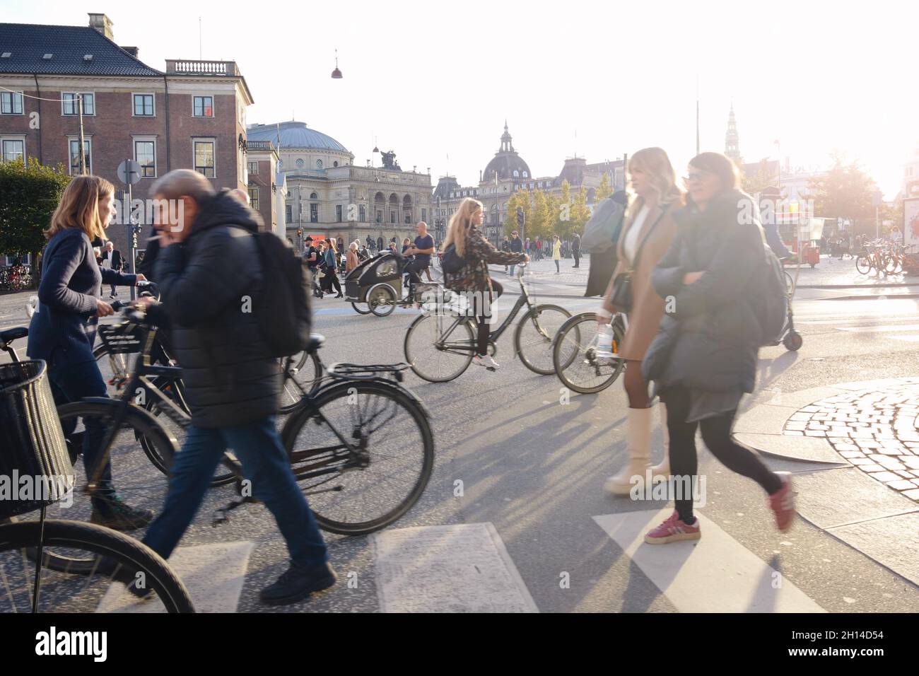 Cyclists and pedestrians on Kongens Nytorv (King's New Square), Copenhagen, Denmark, Scandinavia, October 2021 Stock Photo