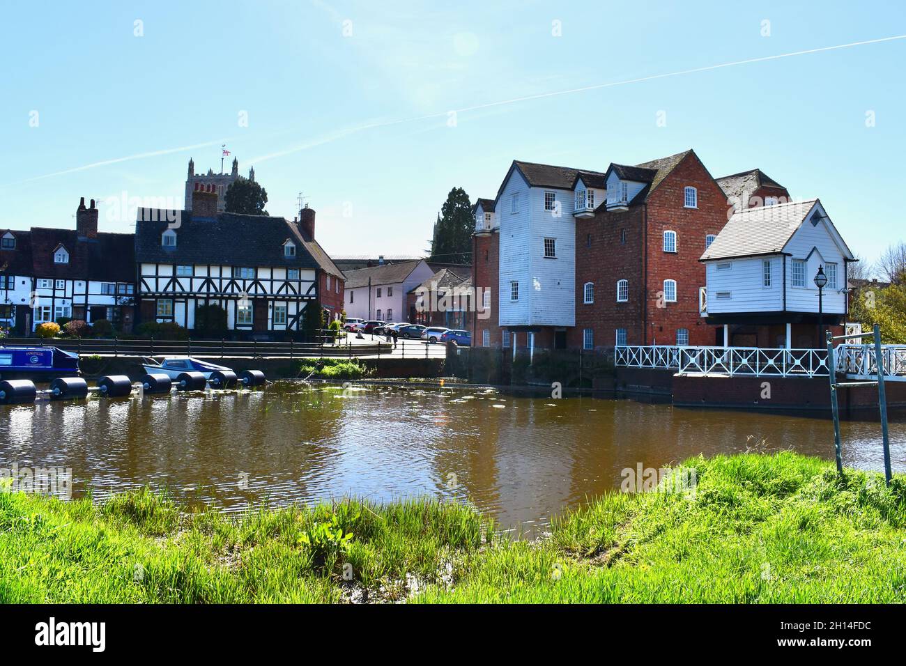 This pretty riverside view of old riverside cottages and Tewkesbury