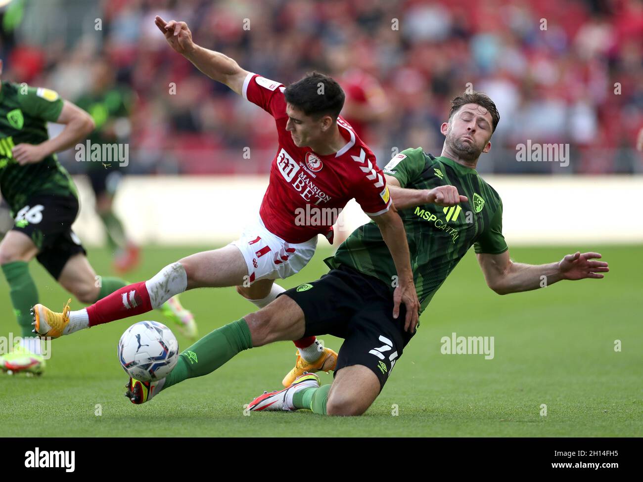 Bristol City's Callum O'Dowda and Bournemouth's Gary Cahill (right) battle for the ball during the Sky Bet Championship match at Ashton Gate, Bristol. Picture date: Saturday October 16, 2021. Stock Photo