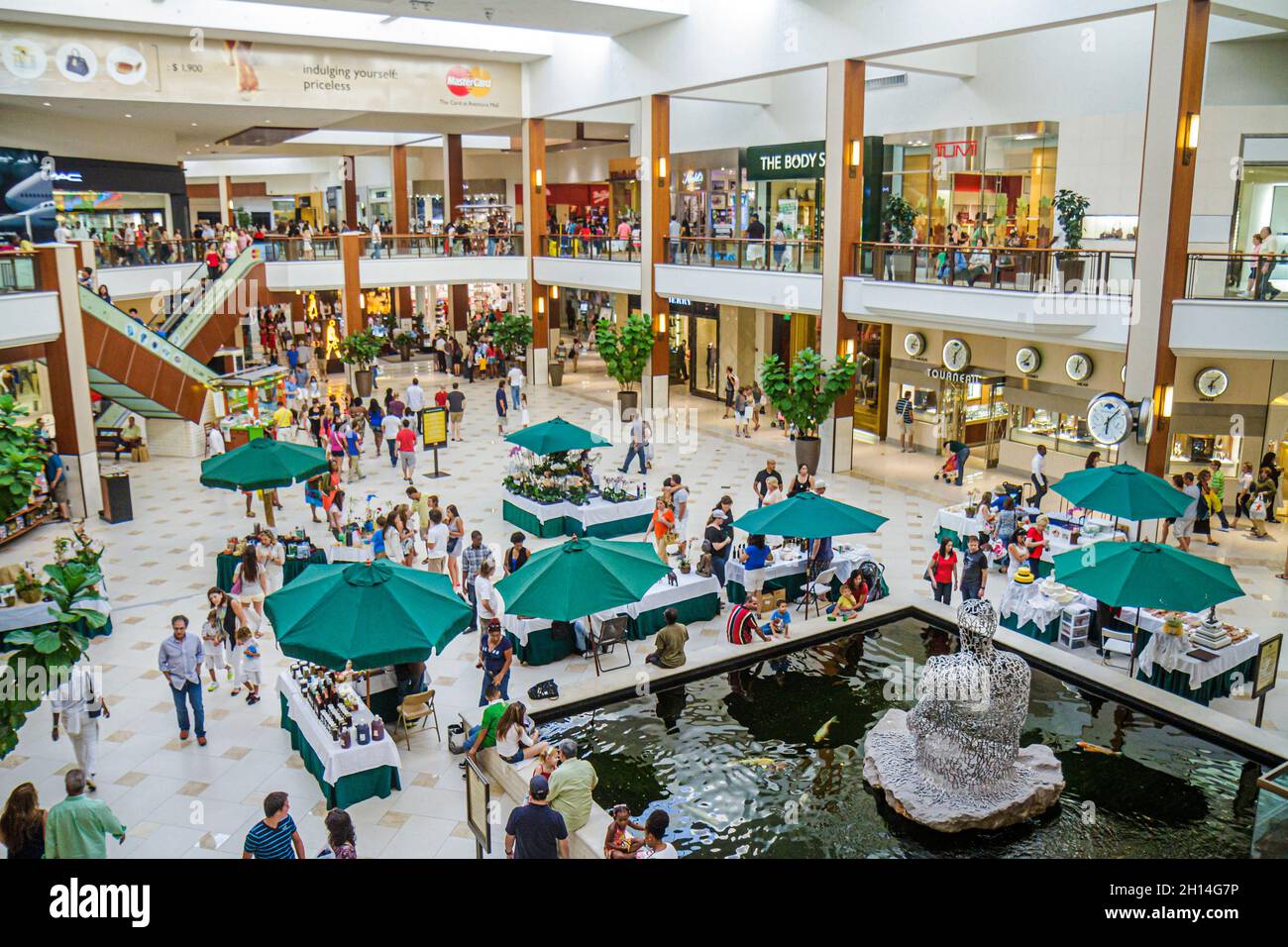 Miami Florida,Aventura Mall stores shoppers shopping fountain enclosed complex inside interior Stock Photo