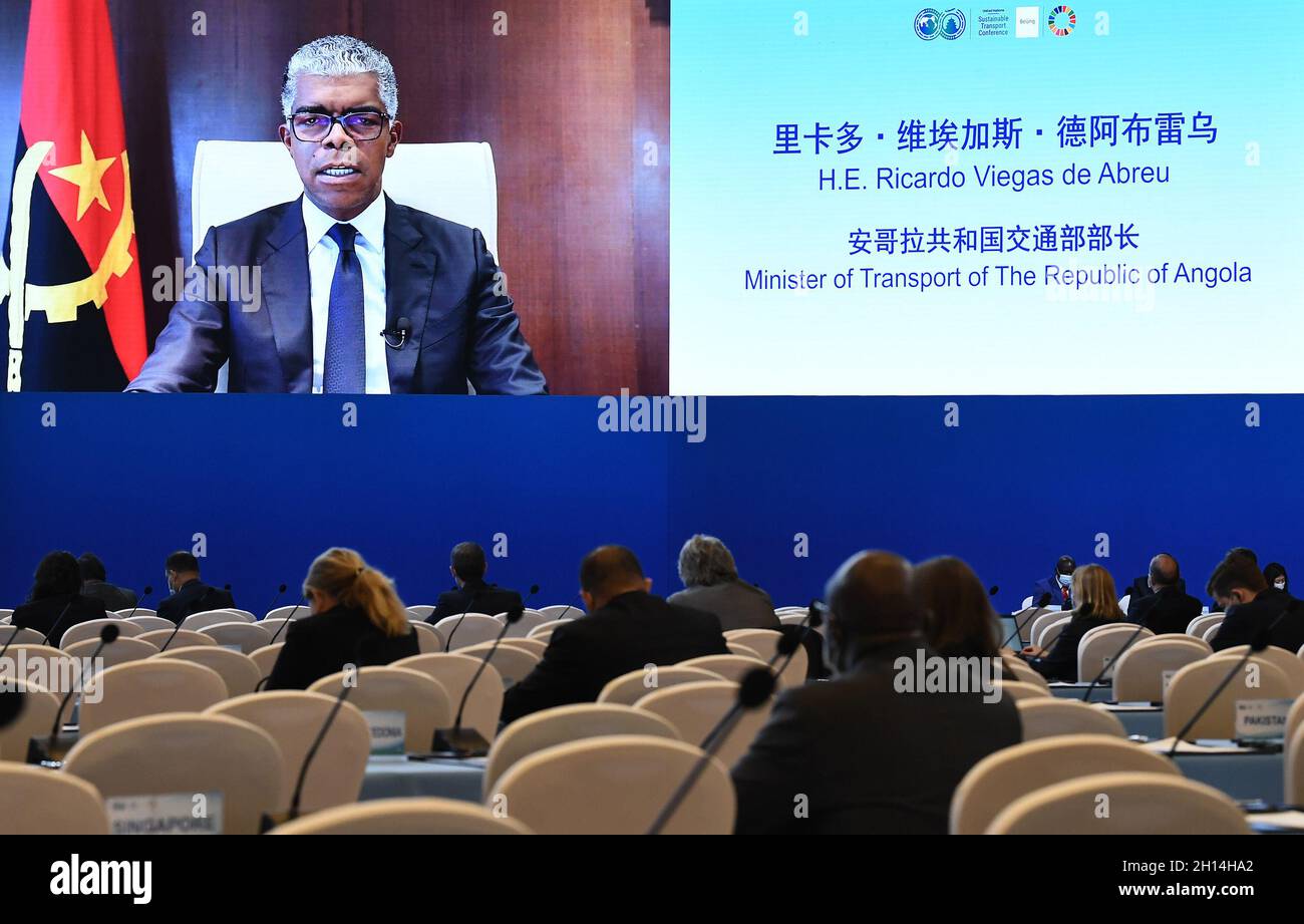 Beijing, China. 16th Oct, 2021. Beijing, China. 16th Oct, 2021. Angolan Minister of Transport Ricardo de Abreu speaks via video link at the third plenary session of the Second United Nations Global Sustainable Transport Conference held in Beijing, capital of China, Oct. 16, 2021. Credit: Li He/Xinhua/Alamy Live News Credit: Xinhua/Alamy Live News Stock Photo