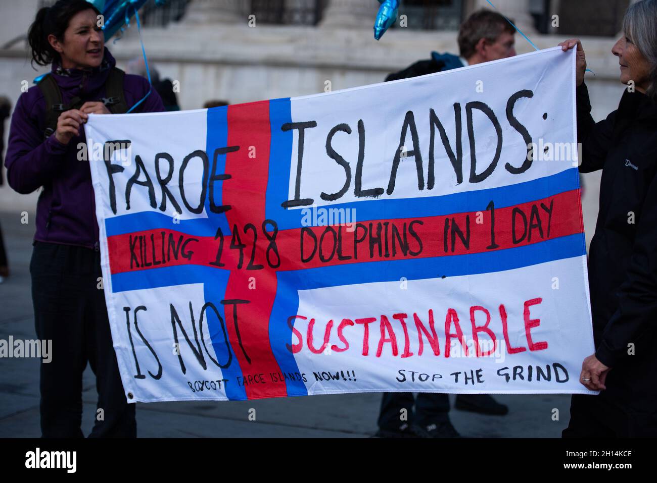 London, UK. 16th Oct, 2021. London, UK. 16th Oct, 2021. Activists hold banners during the Stop the Whale and Dolphin Slaughter Protest.Born Free's Policy Advisor Dominic Dyer calls for sanctions NOW to end the shameful Faroe Islands slaughter of whales and dolphins. The brutal slaughter of more than 1,400 white-sided dolphins in the Faroe Islands has triggered huge anger and revulsion around the world, and once again brought global attention to the long and bloody history of whale and dolphin-killing in this beautiful but isolated archipelago 200 miles north-west of Scotland. Credit: SOPA Imag Stock Photo