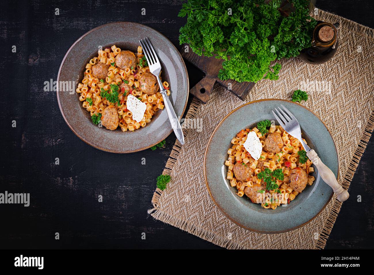 Italian traditional ditalini pasta with meatballs in tomato sauce and