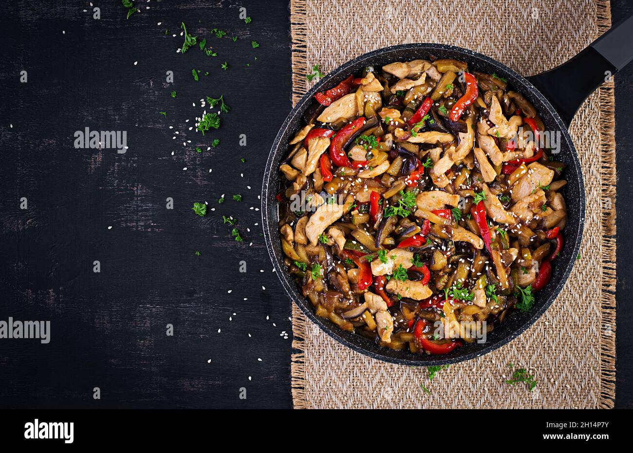 Stir fry with chicken, eggplant, zucchini and sweet peppers Chinese