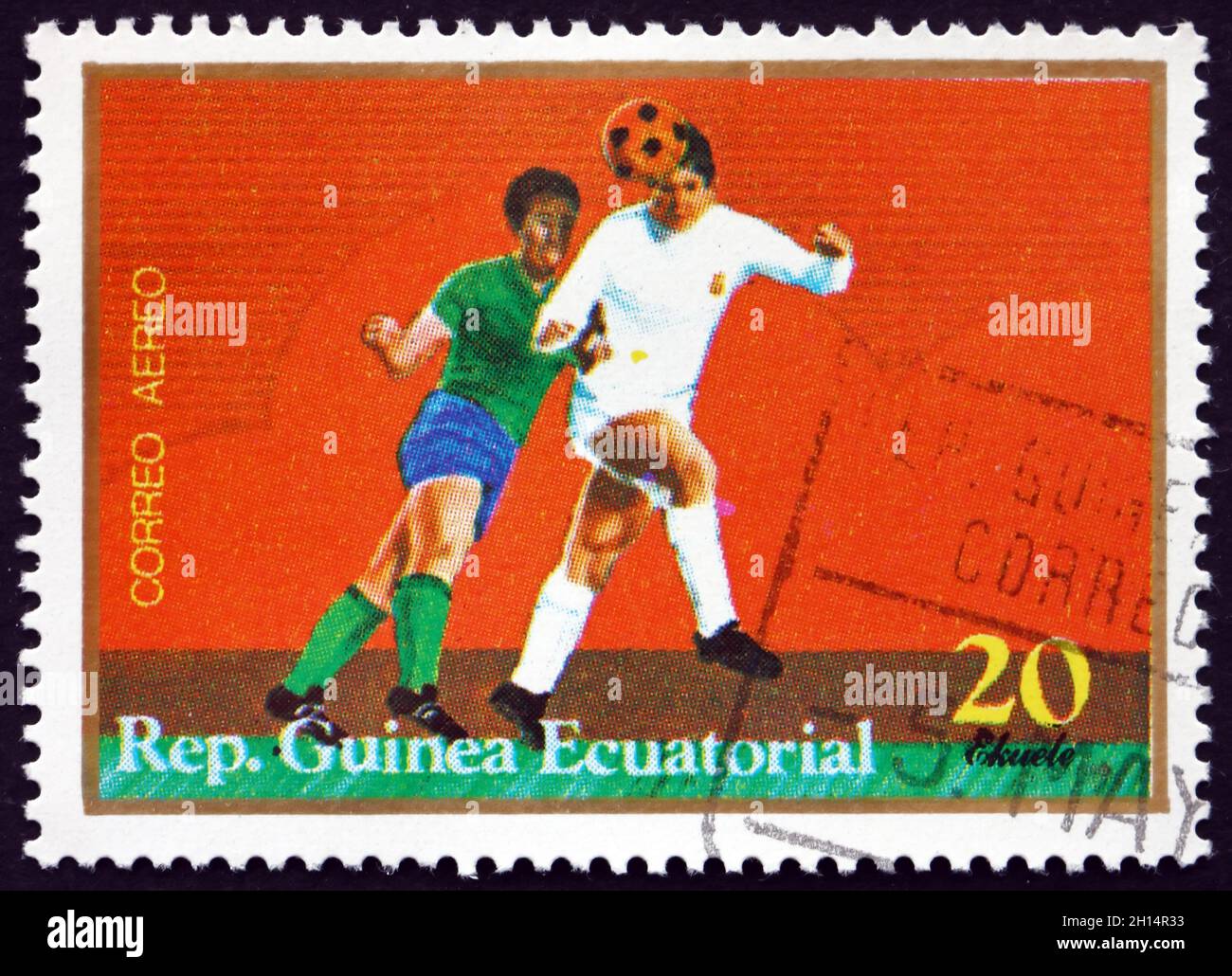 EQUATORIAL GUINEA - CIRCA 1977: a stamp printed in Equatorial Guinea shows Players in Action, Soccer, circa 1977 Stock Photo