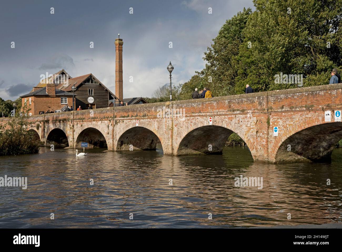 Tramway Bridge is a redbrick structure built over the River Avon in 1823 to carry the horse tramway which connected the wharves at Stratford upon Avon Stock Photo