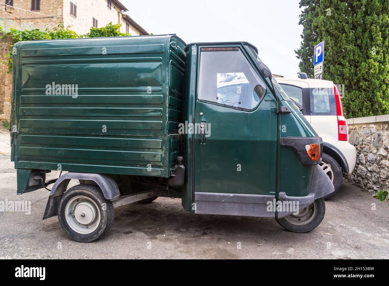 SAN GIMIGLIANO, ITALY - SEPTEMBER 17, 2018: This is an Italian commercial cargo scooter Piaggio Ape 50 Catalyzed. Stock Photo