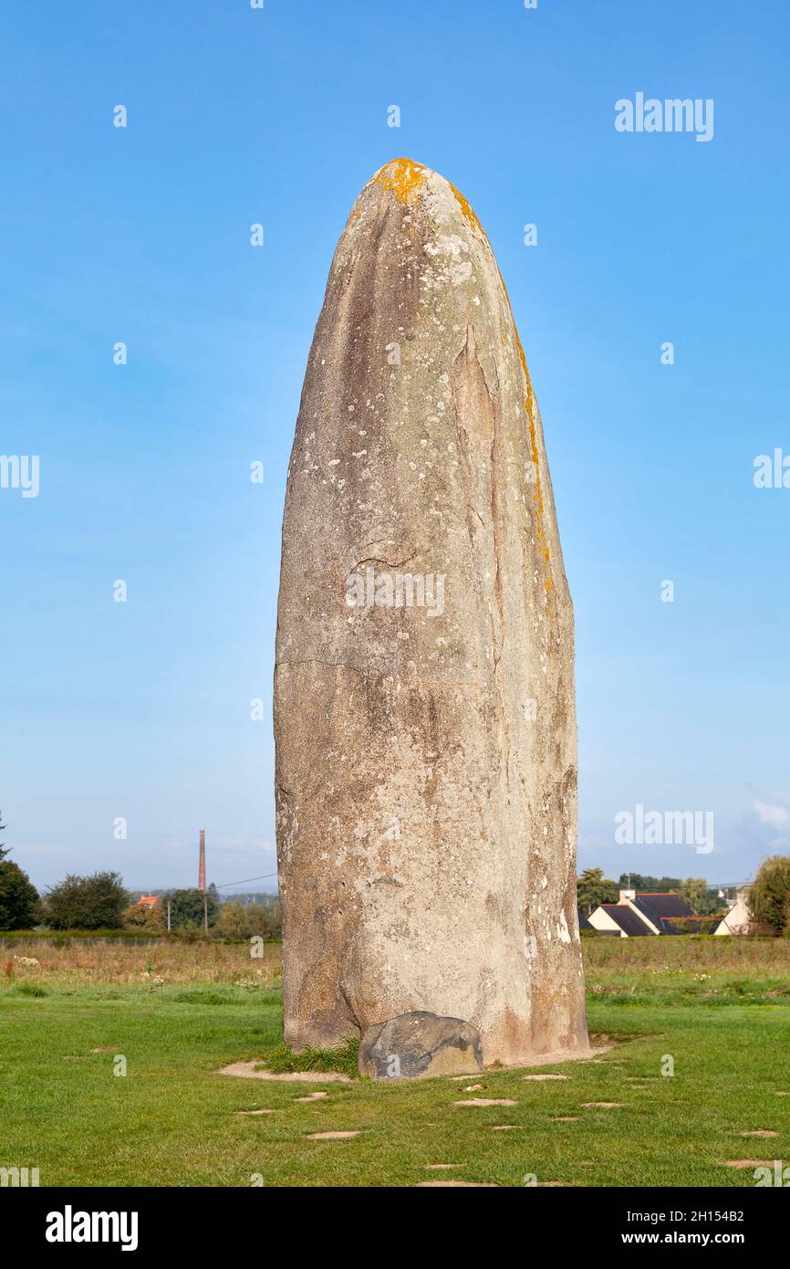The Champ-Dolent menhir is located in Dol-de-Bretagne. With its 9.30m high, it is one of the tallest standing menhirs in Brittany. Stock Photo