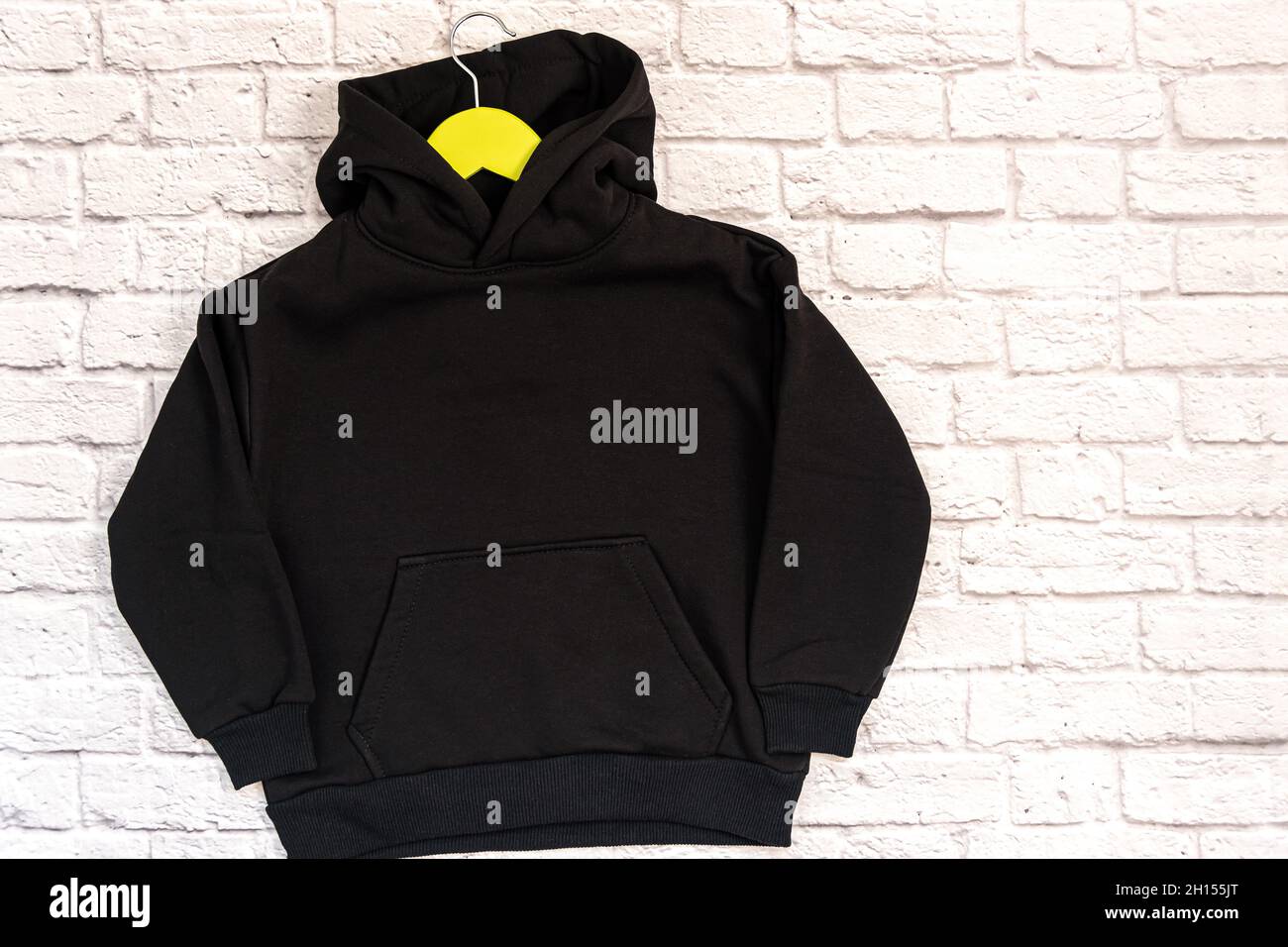 Black sweatshirt with a hood mockup template. Stock Photo