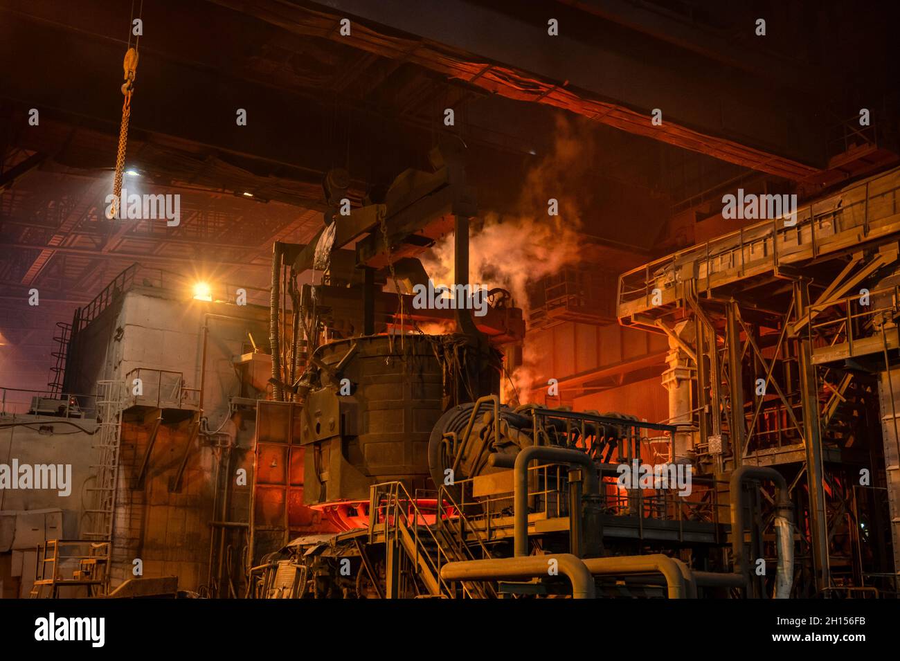 Loading scrap metal into electric arc furnace Stock Photo Alamy