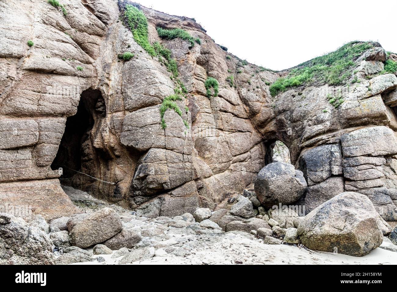 Rock tunnels at Porthgwarra Beach, Penwith Peninsula, Cornwall, UK Stock Photo