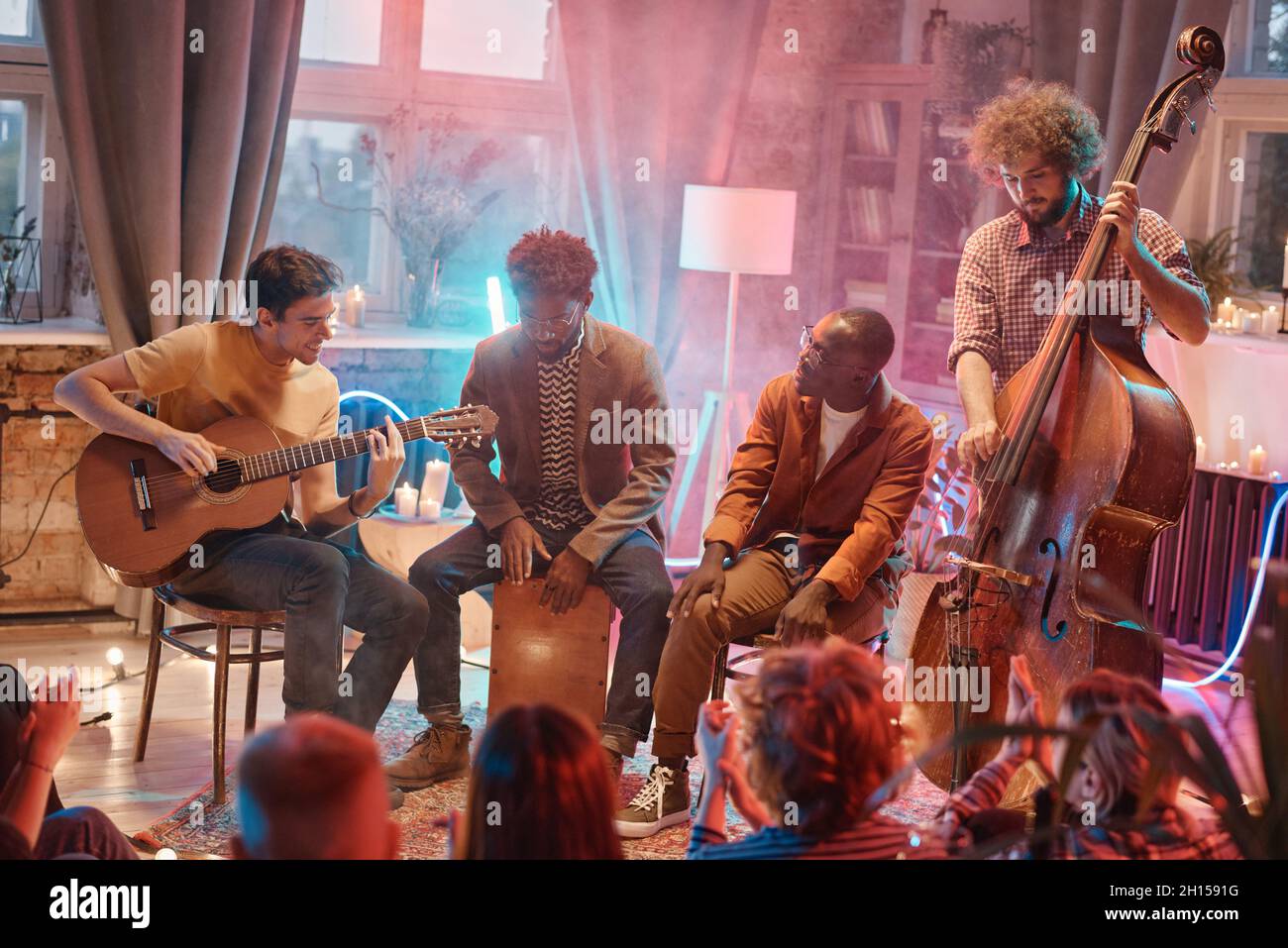 Playing different musical instruments hi-res stock photography and ...