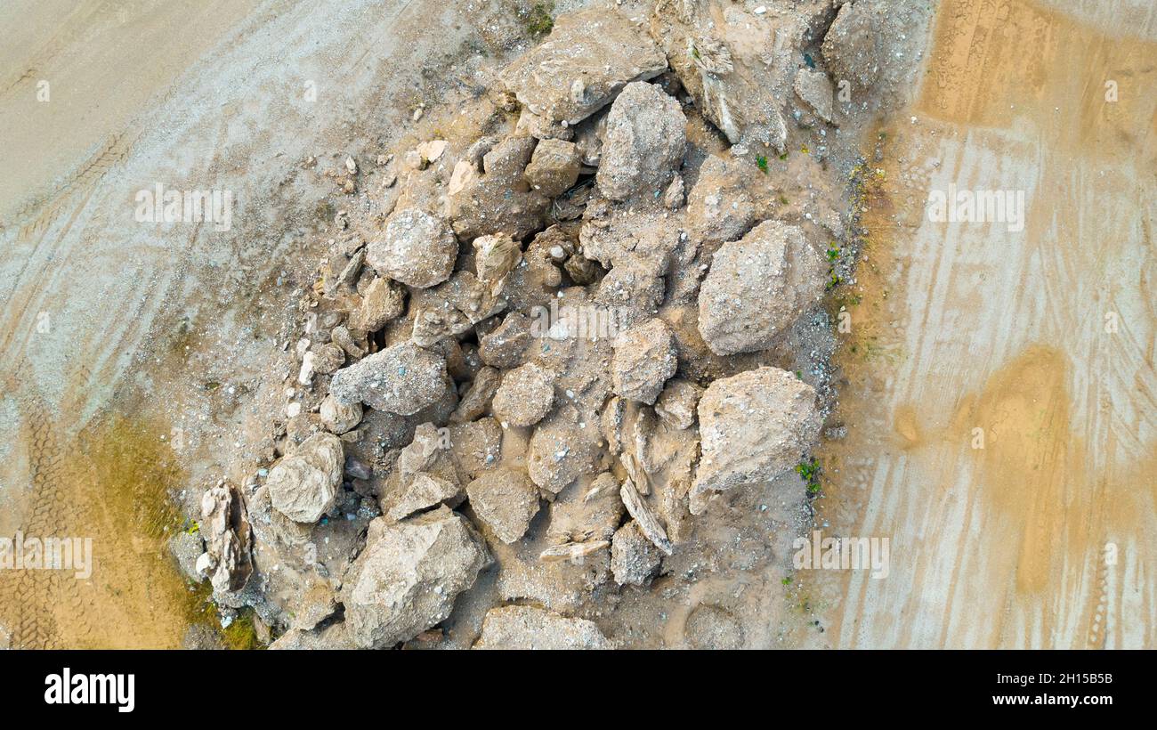 Open pit gravel mining sight with gravel field, big stones photographed from above with a drone. Mining industry Stock Photo