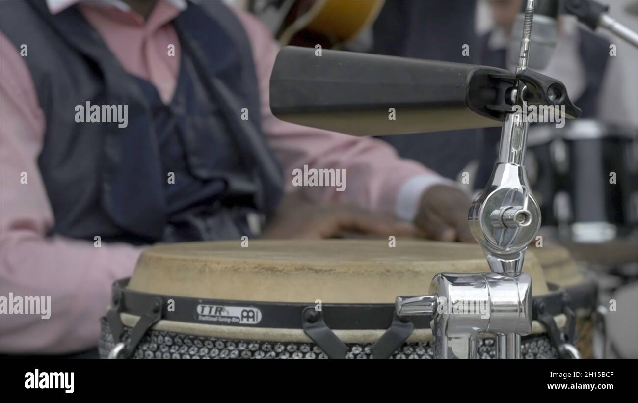 Hands drumming. Drummer playing on drum set on stage. Drummer pounding