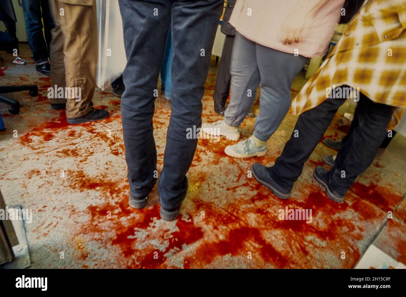 Paris, France, Medium Group People, detail, legs, Spilled Blood on Floor, Aids Activists of Act Up Paris, Demonstrate in Government Office of CAF, for Assistance to Handicapped Persons, AAH, 1994, aids 1990s, public health challenges Stock Photo