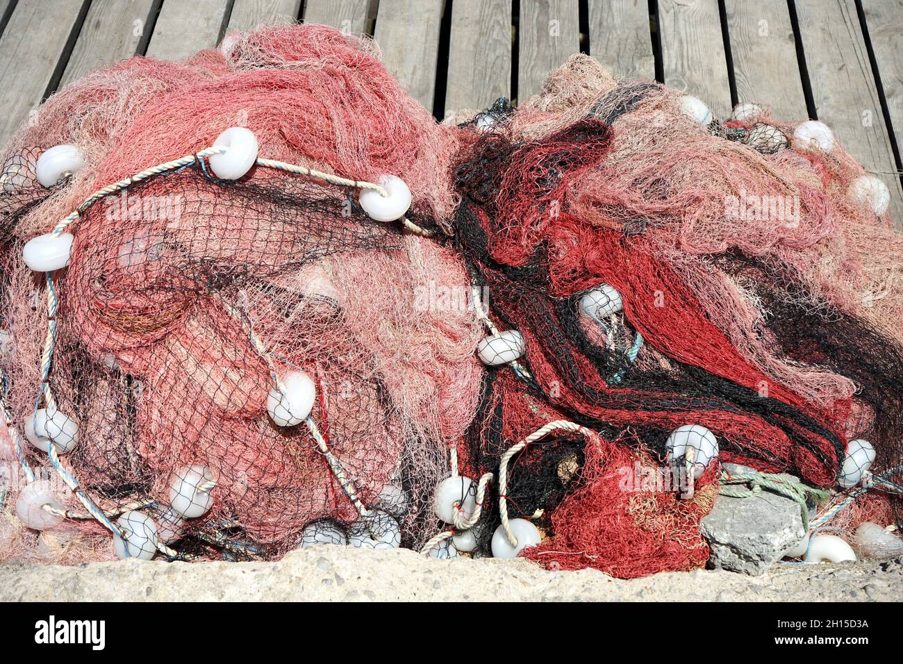 fishing net on the ground Stock Photo - Alamy