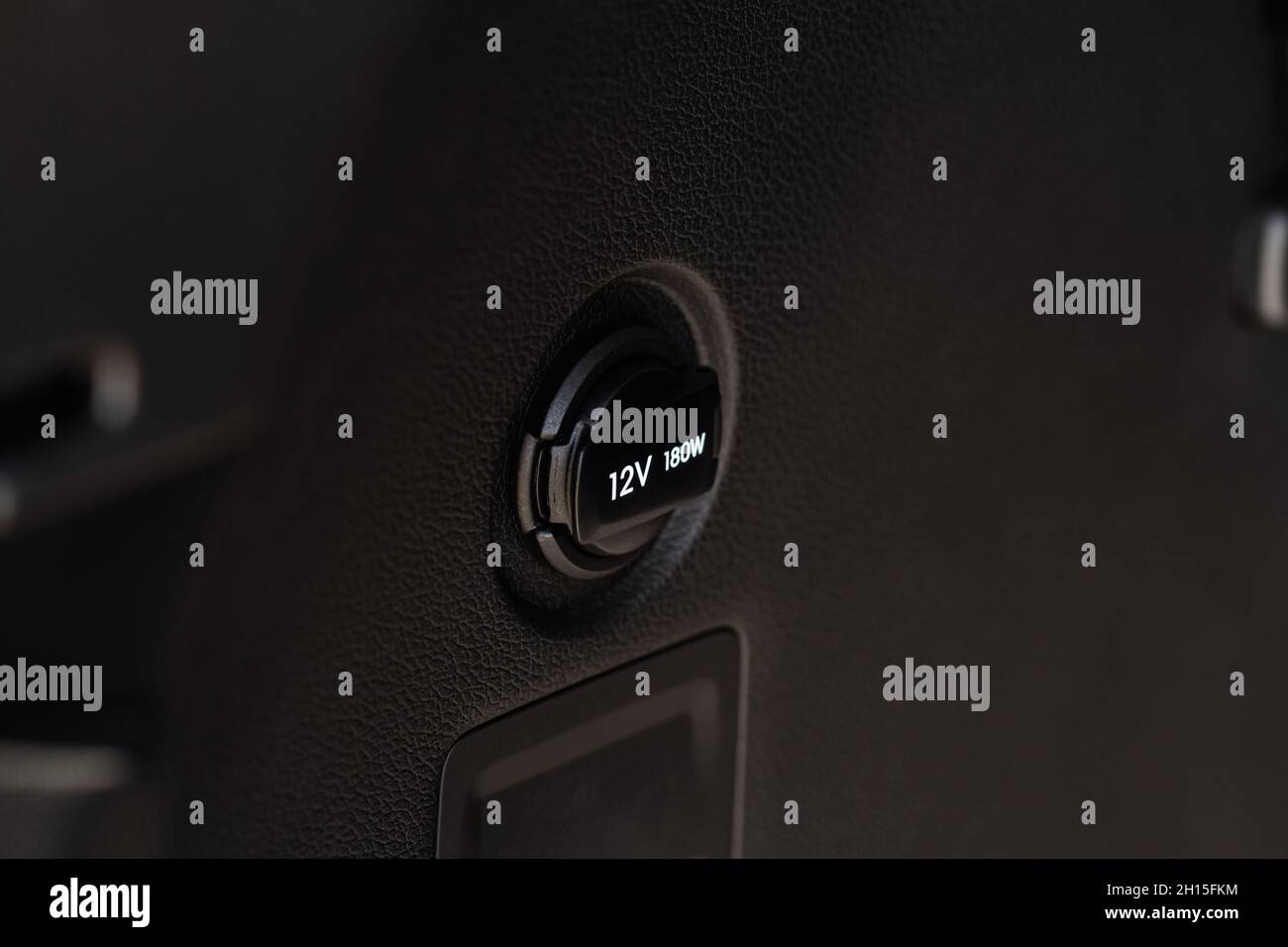 12V power socket in a car. Outlet socket in a car Stock Photo Alamy
