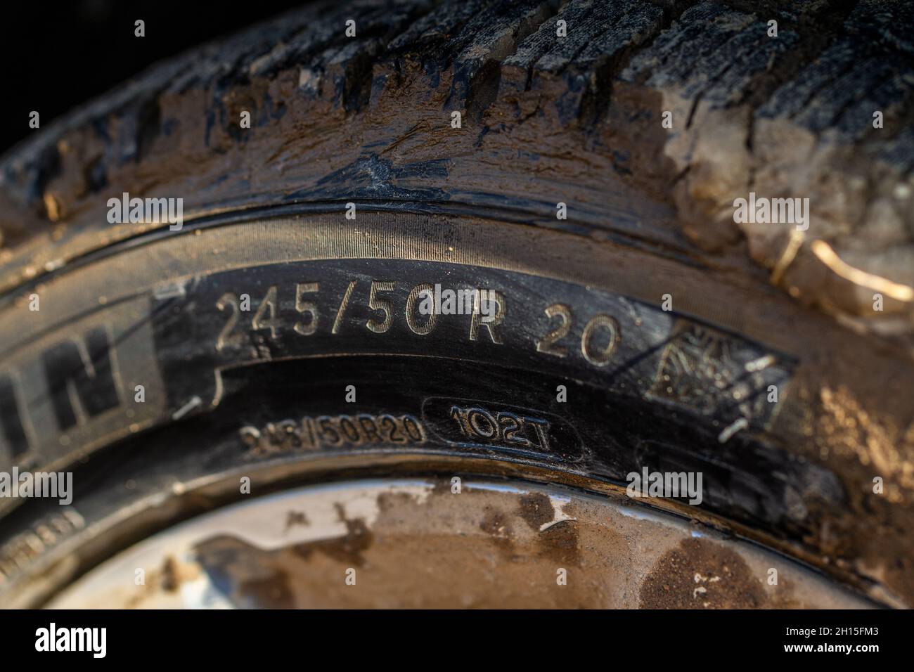 Close up view of tire with width, height and wheel diameter designation