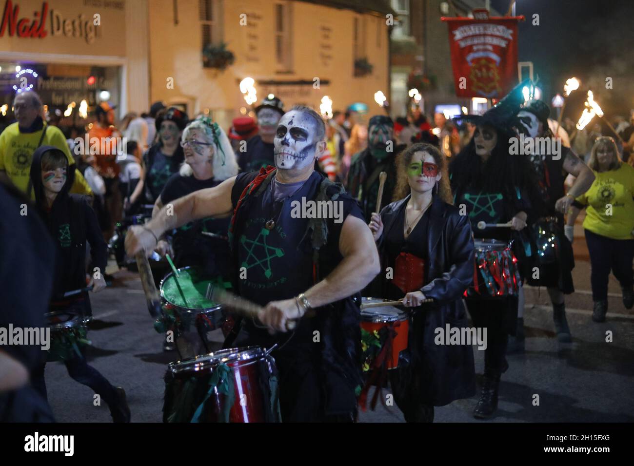 Hailsham, UK. 16th Oct 2021. Visiting bonfire societies parade in Hailsham this evening as Bonfire night returns to the town.  The event was cancelled in 2020 due to covid restrictions. Credit:Ed Brown/Alamy Live News Stock Photo