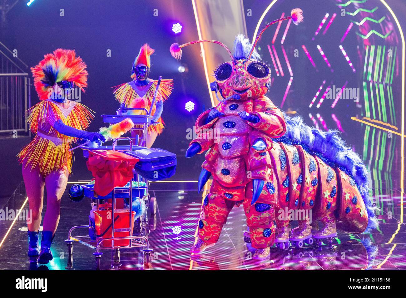 Cologne, Germany. 16th Oct, 2021. The character "The Caterpillar" is on  stage in the Prosieben show "The Masked Singer". On "The Masked Singer",  celebrities appear as singers, but hide their identity behind