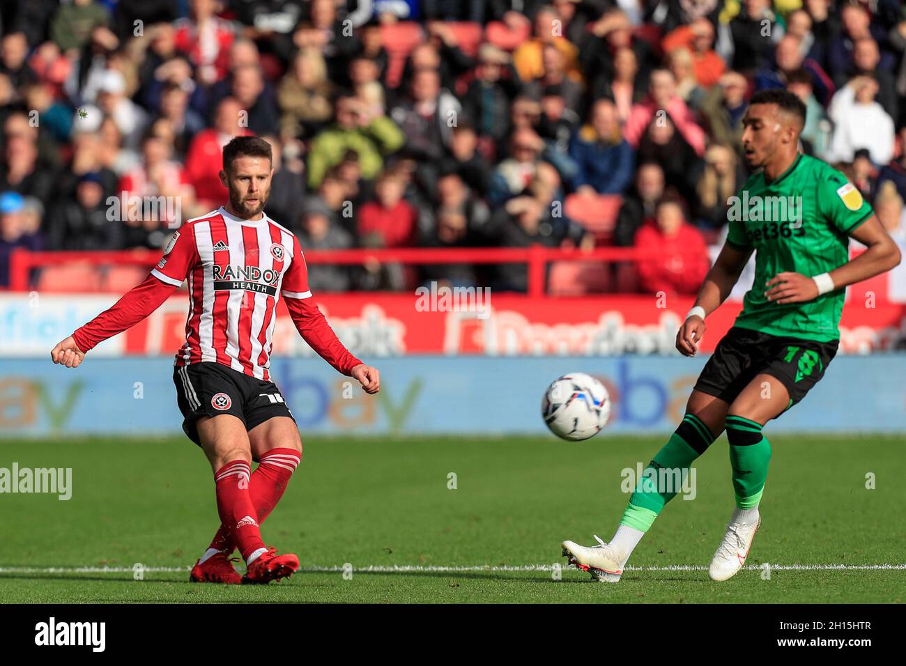 Sheffield, UK. 16th Oct, 2021. Oliver Norwood #16 of Sheffield United chips the ball forward in Sheffield, United Kingdom on 10/16/2021. (Photo by James Heaton/News Images/Sipa USA) Credit: Sipa USA/Alamy Live News Stock Photo