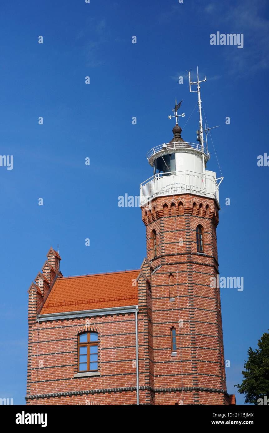 USTKA, POLAND - Aug 06, 2013: The old neo-Gothic lighthouse building ...