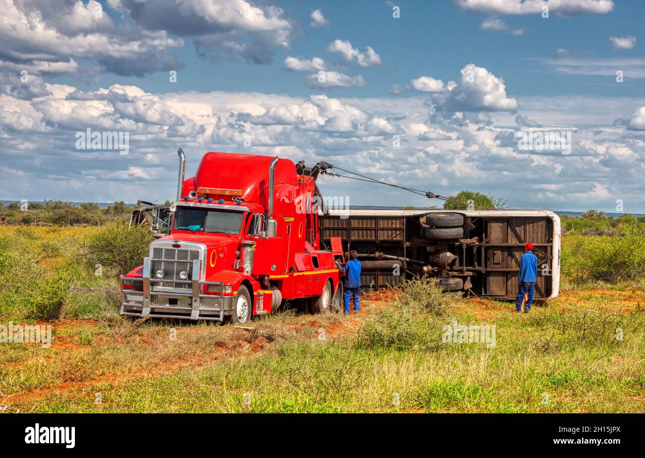 Recovery truck hoisting a bus what was in a severe accident Stock Photo Alamy