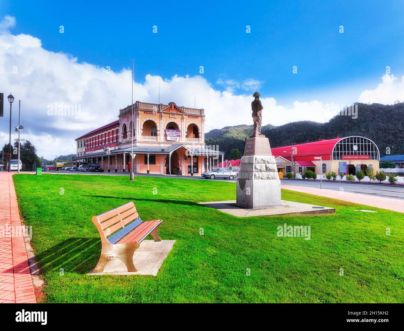 Queenstown, Australia - 24 April 2014: Memorial park, the EMpire hotel and the railway station in QUeenstown of West Coast coucil, Tasmania. Stock Photo
