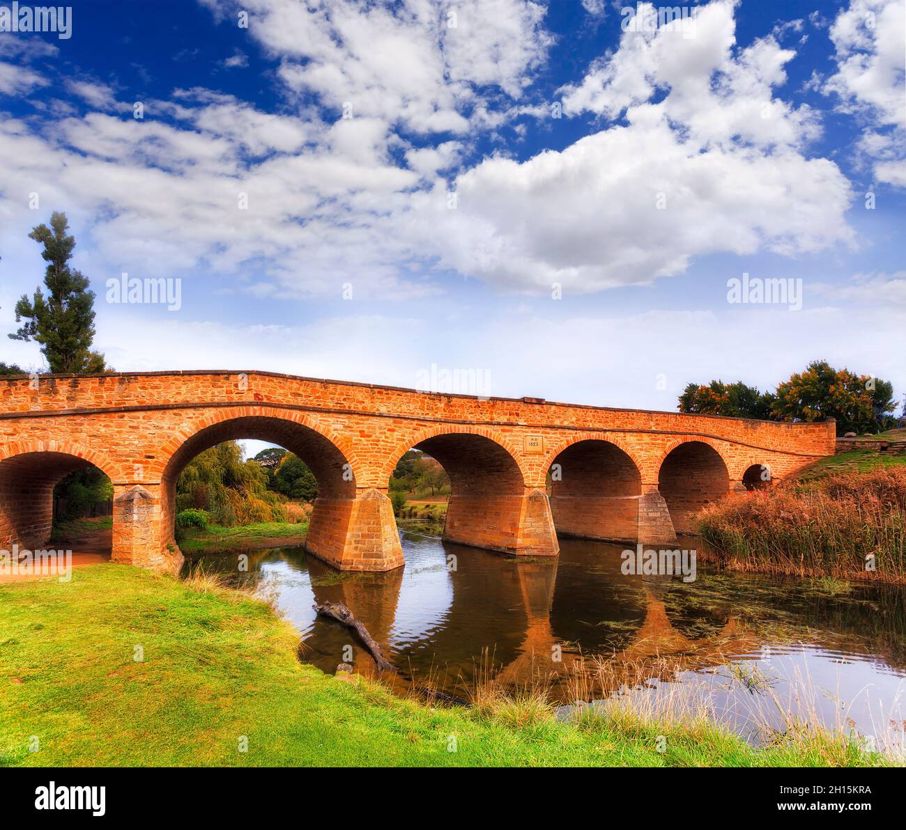 Old historic stone made masonry bridge in RIchmond town of Australia across the river. Stock Photo