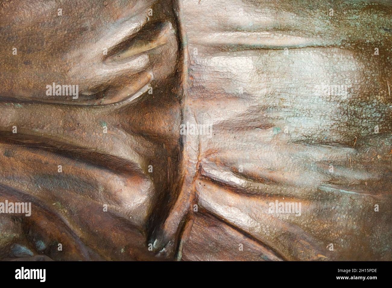 Close-up photo texture of copper or bronze statue material with ...