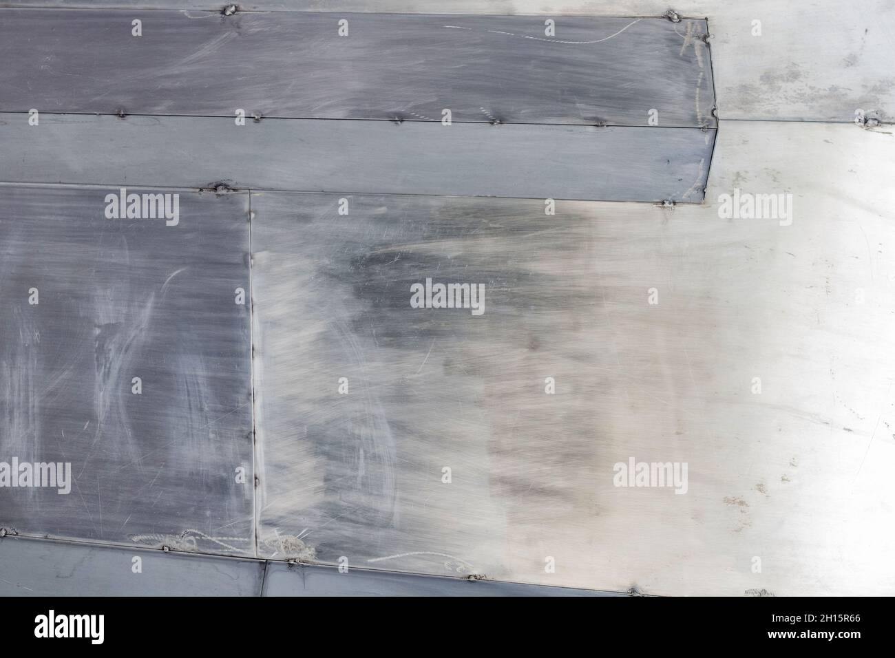 Texture photo of stainless steel yellow and blue armored scratched ...