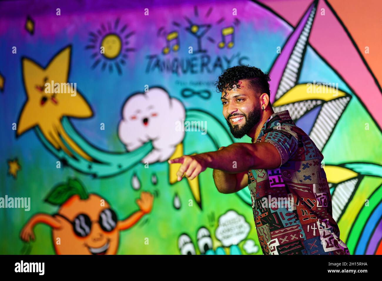 Attendee poses for a picture during Immerse Festival by Creative City